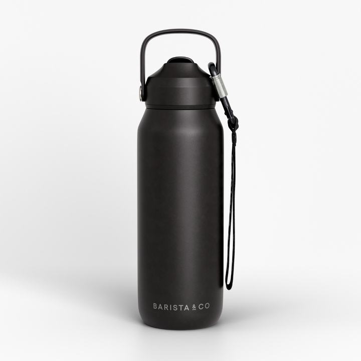 A matte black insulated water bottle with a matching black lid and carrying loop, shown on a clean white background.