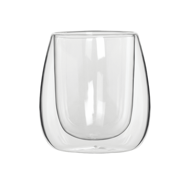 Clear glass tumbler on a white background